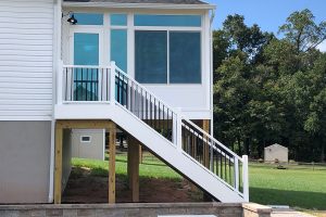 deck for a sunroom structure